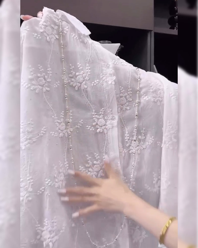 Linnea – Broderad skjorta med tappad axel - Stockholm-Select